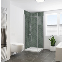 Badezimmer mit Dusche, Toilette, Handtuchwärmer, Pflanze und Fenster für ein helles, organisiertes Ambiente.