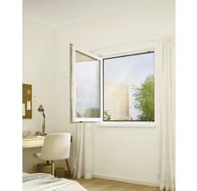 Einrichtung eines Arbeitszimmers mit Dreh-Kipp-Fenster und Blick ins Grüne