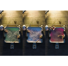 Drei Whirlpools auf einer Holzterrasse mit Badegästen und farbiger Beleuchtung.