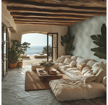 Wohnzimmer mit großem Sofa, Holzbalkendecke und Meerblick