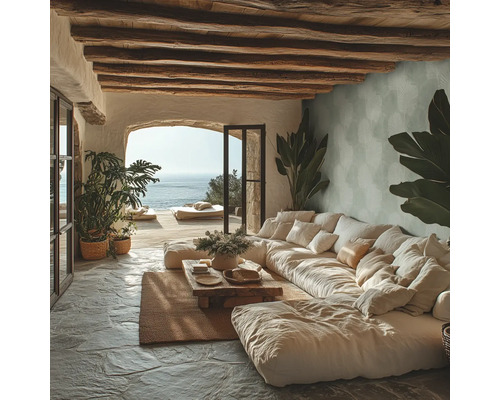 Wohnzimmer mit großem Sofa, Holzbalkendecke und Meerblick