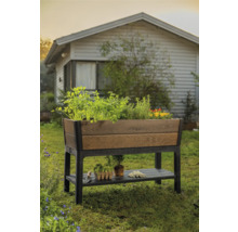 Hochbeet aus Holz und Kunststoff mit Ablage im Garten