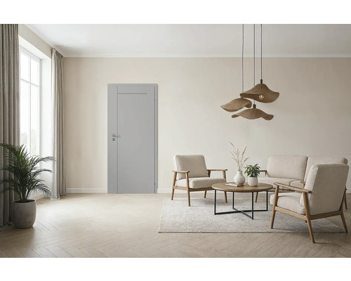 Wohnzimmer mit Innentür, Sitzgruppe und Dekoration