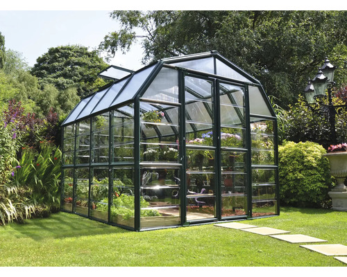 Gewächshaus Palram – Canopia Grand Gardener 8x8 Polycarbonatplatten 0,8 mm 267 x 764 cm grün Gewächshaus im Garten mit Pflanzen und offenem Dachfenster
