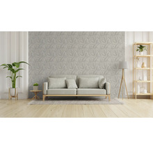 Wohnzimmer mit Sofa, Pflanze und Regal