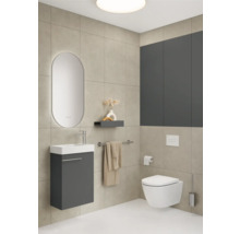 Modernes Badezimmer mit Waschtisch, Spiegelschrank, Wandtoilette und Fliesen