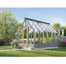 Gewächshaus mit Glaswänden im Garten