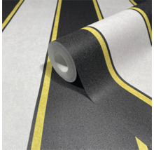 Tapetenrolle mit Streifenmuster in Schwarz, Weiss und Gelb
