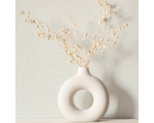 Dekorative Vase mit Pflanzenstängeln