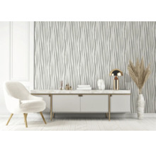 Modernes Wohnzimmer mit weißen 3D Wandpaneelen, Kommode, Sessel und Dekorationen