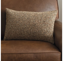 Rechteckiges Zierkissen auf einem Ledersofa