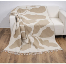 Decke mit Pflanzenmuster auf Sofa