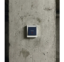 Heizungsschalter an einer Betonwand