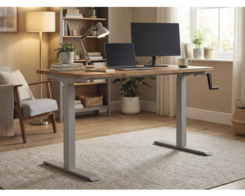 Höhenverstellbarer Schreibtisch mit Handkurbel, Laptop und Monitor in einem hellen Raum.