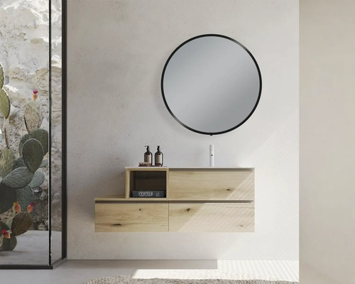 Modernes Badezimmer mit Waschtischunterschrank, rundem Spiegel und dekorativer Glaswand