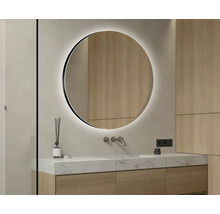 Modernes Badezimmer mit rundem Spiegel und Waschtisch