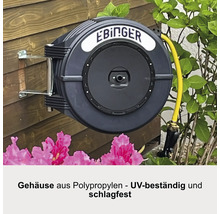 EBInger Schlauchaufroller mit gelbem Schlauch an einer Holzwand montiert