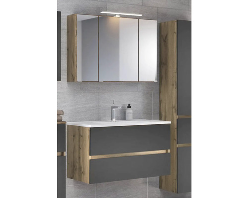 Modernes Badezimmermöbel-Set mit Spiegelschrank, LED-Leuchte, dunklem Waschtischunterschrank in Holzoptik und weißem Waschbecken.