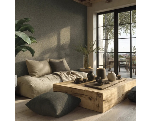 Wohnzimmer mit Sofa, Couchtisch aus Holz und Zimmerpflanze