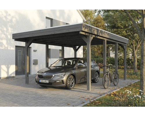 Holzcarport mit Auto und Fahrrad vor einem Haus