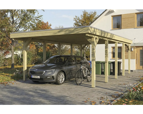 Ein Carport aus Holz mit einem Auto und einem Fahrrad davor.