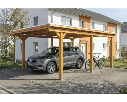 Carport aus Holz mit Auto und Fahrrad