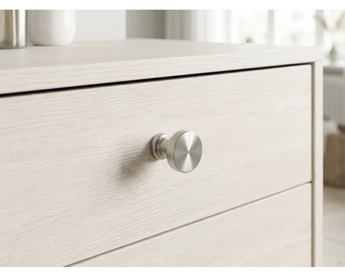 Nahaufnahme einer Kommode mit Schubladen und rundem Griff