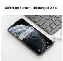 Smartphone neben einer Tastatur zeigt eine Imou Life Benachrichtigung über eine erkannte Person innerhalb von 0,3 Sekunden an.
