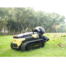 Gelb-schwarzer Yarbo Gartenroboter mit Gummiketten auf einem grünen Rasen im Garten.