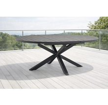 Runder Gartentisch aus Metall mit Tischplatte in Lattenoptik und gekreuztem Sternfuß auf einer Terrasse.