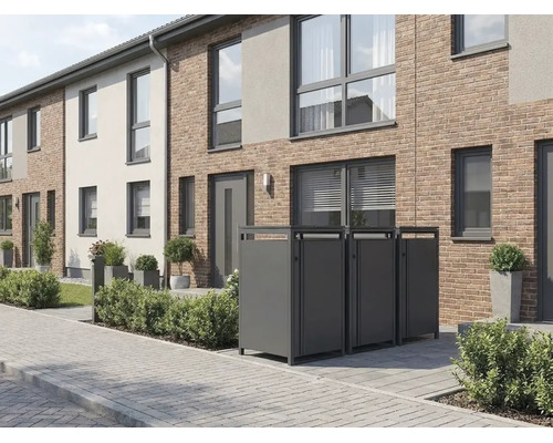 Moderne Mülltonnenboxen aus Metall vor einem Reihenhaus mit Klinkerfassade und gepflastertem Gehweg.