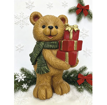 Weihnachtsfigur Teddybär mit grünem Schal und roten Geschenken, Dekoration für Weihnachten.