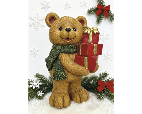 Weihnachtsfigur Teddybär mit grünem Schal und roten Geschenken, Dekoration für Weihnachten.