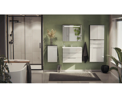 Modernes Badezimmer mit weißen Möbeln, grüner Wand, ebenerdiger Dusche mit schwarzem Rahmen, Badewanne und beleuchtetem Spiegel über dem Waschtisch.