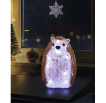 LED-Deko-Figur Igel aus Acryl mit kristalliner Oberfläche, stehend auf einem Tisch in einem festlich dekorierten Raum mit Weihnachtsdekoration.