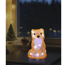 LED-Deko-Figur Fuchs aus Acryl mit warmweißem Licht in weihnachtlicher Atmosphäre auf einem Tisch vor einem Fenster.