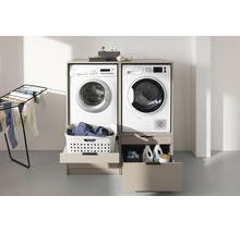Waschmaschinenschrank für Waschmaschine und Trockner nebeneinander mit integrierten Schubladen und Auszügen für Wäschekorb.