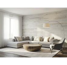 Wandpaneele in Holzoptik im hellen, modernen Wohnzimmer mit Ecksofa und rundem Couchtisch.