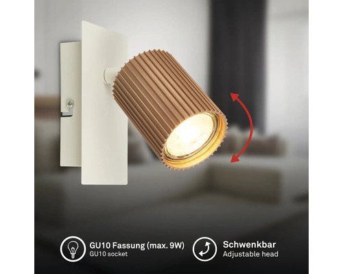 Schwenkbarer Wandstrahler mit geriffeltem Lampenkopf auf rechteckiger Halterung, GU10-Fassung für maximal 9 Watt.