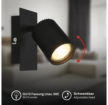 Schwarze Wandleuchte mit geriffeltem, schwenkbarem Strahler, GU10 Fassung für maximal 9 Watt.