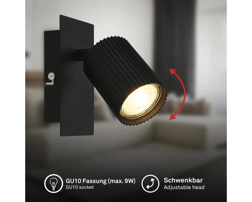 Schwarze Wandleuchte mit geriffeltem, schwenkbarem Strahler, GU10 Fassung für maximal 9 Watt.