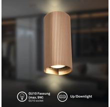 Zylindrische Wandleuchte mit vertikaler Riffelung, GU10 Fassung für maximal 9 Watt, Up- und Downlight-Funktion.