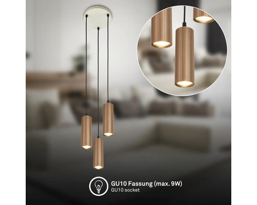 Dreiflammige Pendelleuchte mit zylindrischen, geriffelten Schirmen und GU10-Fassungen für maximal 9 Watt.