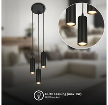 Dreiflammige schwarze Pendelleuchte mit zylindrischen, geriffelten Schirmen und GU10-Fassung für maximal 9 Watt in einem hellen Wohnzimmer.