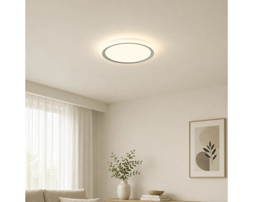Runde LED-Deckenleuchte in einem hellen, modern eingerichteten Wohnzimmer mit minimalistischem Design.