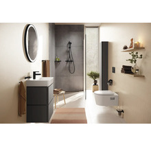 Modernes Badezimmer mit anthrazitfarbenem Waschtisch, rundem LED-Spiegel, ebenerdiger Dusche und weißem Wand-WC.