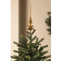 Glänzende Christbaumspitze auf einem Weihnachtsbaum mit Lichtern.