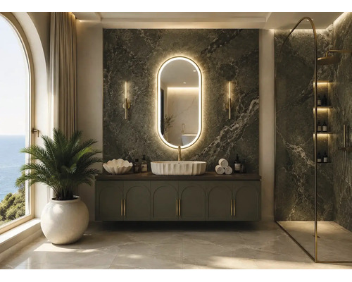 Modernes Badezimmer mit Marmorwand, beleuchtetem ovalem Spiegel, Waschtischunterschrank und begehbarer Dusche mit Goldarmaturen.