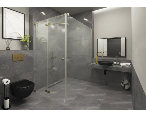 Modernes Badezimmer mit grauen Fliesen, einer Duschkabine aus Glas mit goldfarbenen Details, schwarzem WC und Waschtisch mit goldener Armatur.