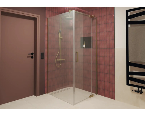Moderne Eckdusche mit Glaselementen und Duschsystem in einem Badezimmer mit Fliesenwand und integrierter Nische.